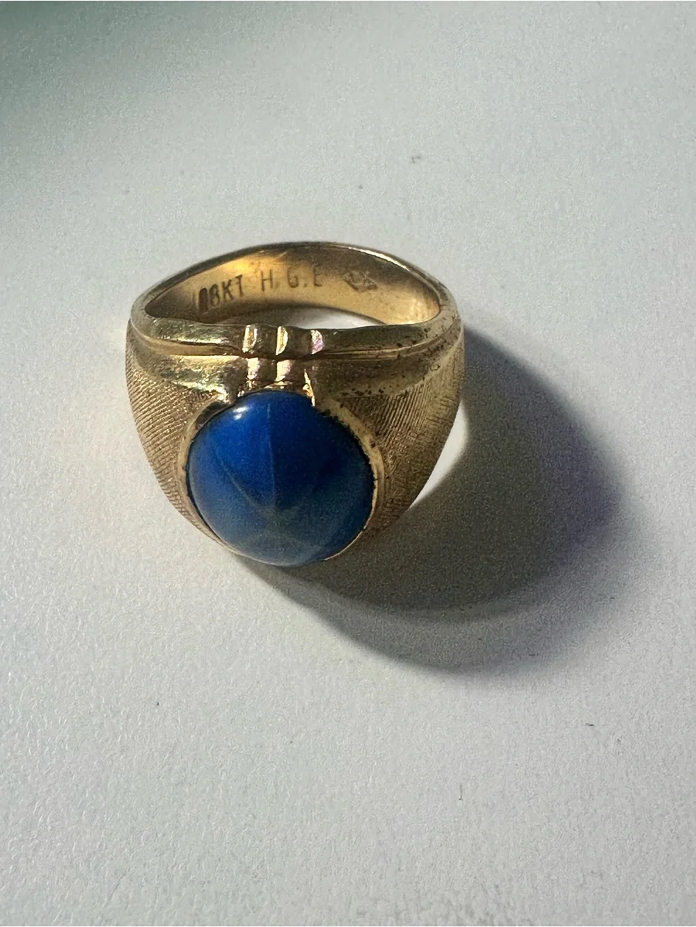 Gold-Tone electroplated size 7 Ring with Blue Oval sapphire men’st
